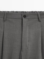 Relaxed fit trousers with darts