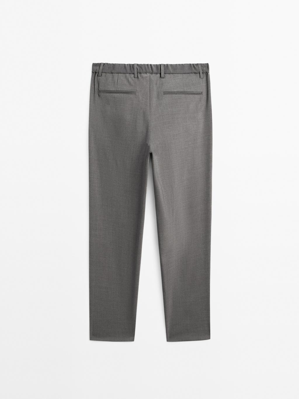 Relaxed fit trousers with darts