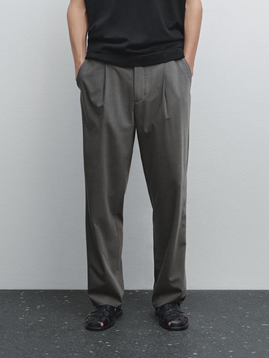 Relaxed fit trousers with darts