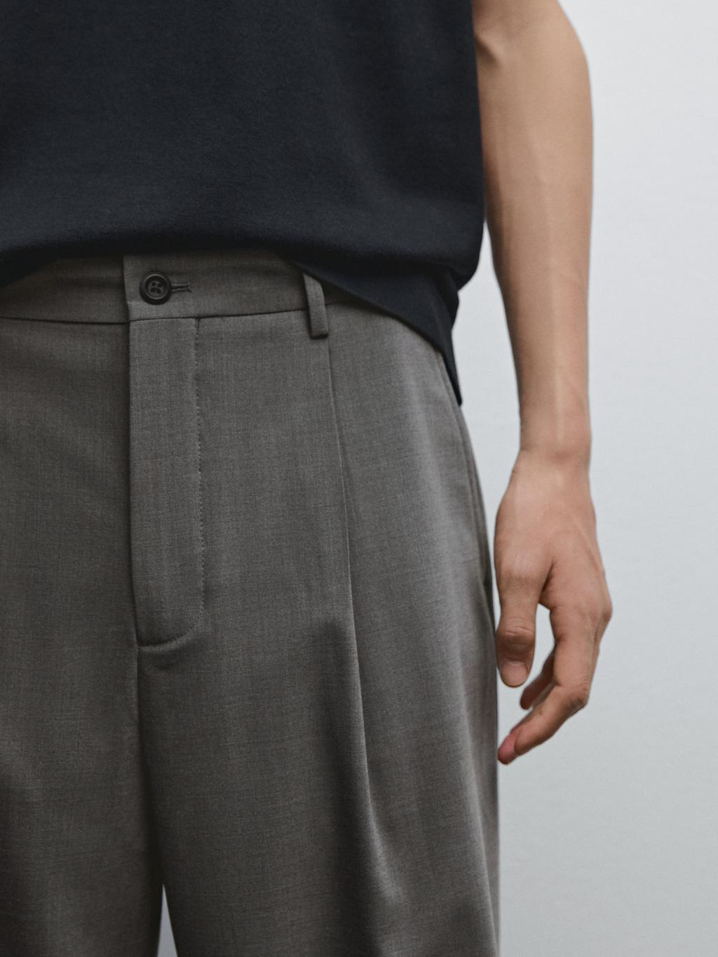 Relaxed fit trousers with darts