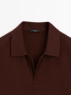 Textured polo shirt with hidden button