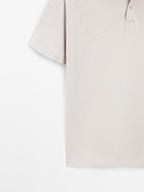 Short sleeve polo shirt with snap-button placket