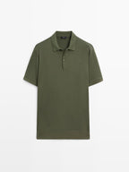 Short sleeve polo shirt with zip-up collar