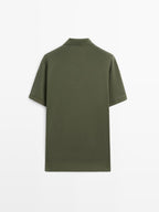 Short sleeve polo shirt with zip-up collar