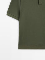 Short sleeve polo shirt with zip-up collar