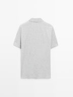 Short sleeve melange polo shirt