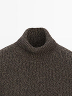 100% wool mouline knit sweater with high neck