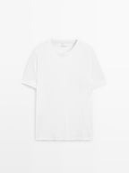 Short sleeve pyjama top and striped trousers