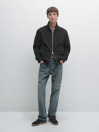 Peach-effect jacket with elbow patch details