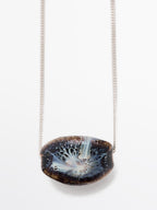 Necklace with ceramic pendant