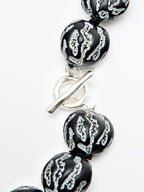 Short pendant with irregular beads