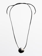 Sheepskin leather necklace with metal piece