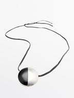 Sheepskin leather necklace with metal piece
