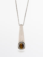 Geometric pendant with stone