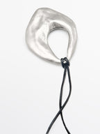 Diluted piece pendant