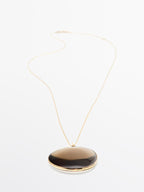 Necklace with translucent stone pendant