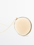 Necklace with translucent stone pendant