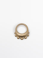 Ring with round pieces