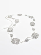 Textured medallion chain belt