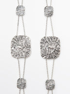 Textured medallion chain belt