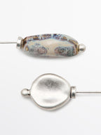 Brooch with ceramic leaf piece