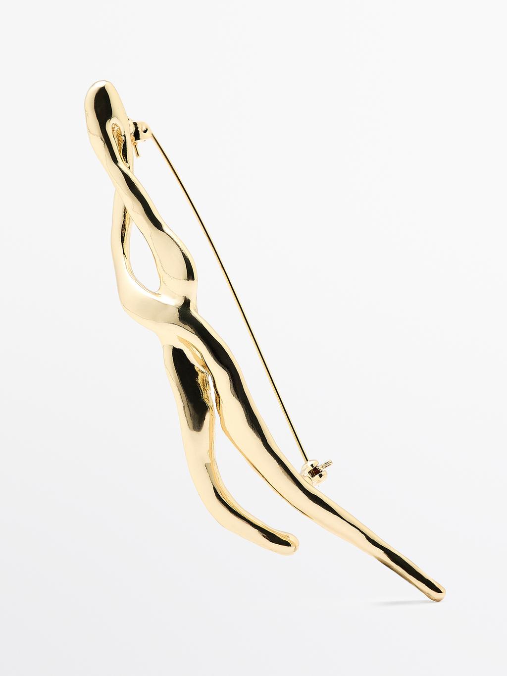 Abstract metal brooch