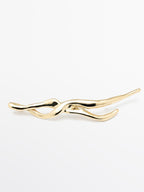 Abstract metal brooch