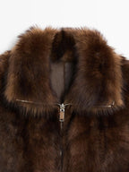 Leather high-neck waistcoat with fur