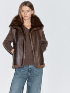 Leather high-neck waistcoat with fur