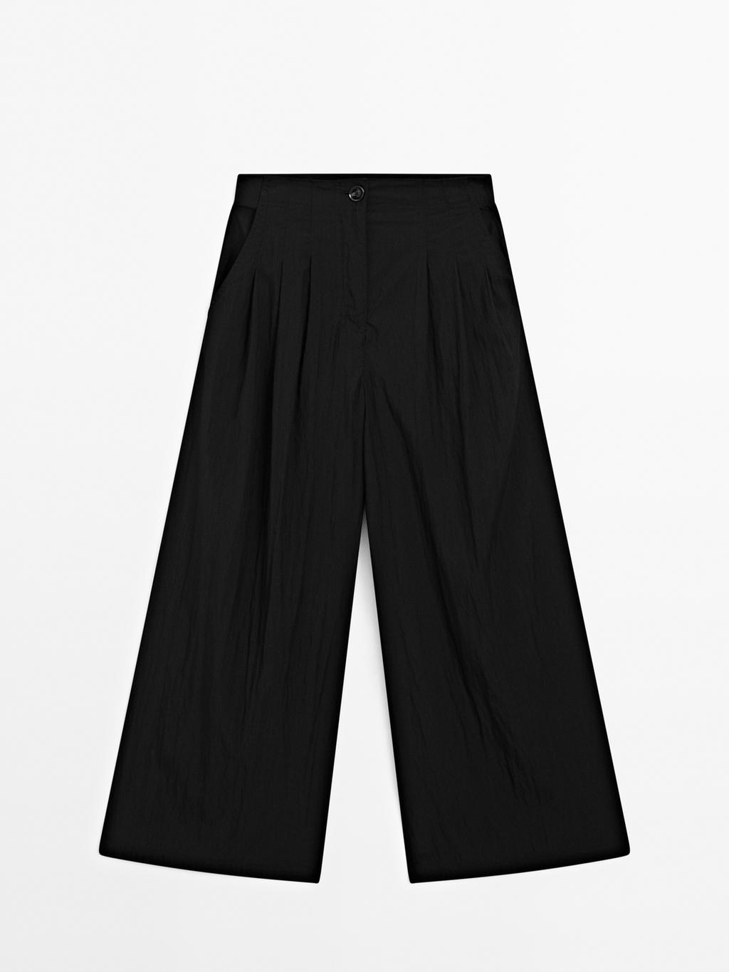 Flowing palazzo trousers with darts