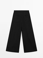 Flowing palazzo trousers with darts