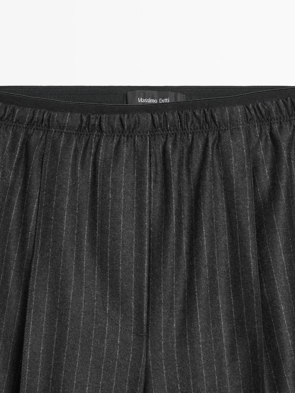 Darted pinstripe trousers