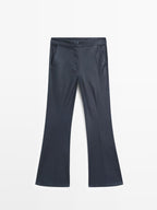 Waxed flare fit trousers