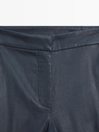 Waxed flare fit trousers