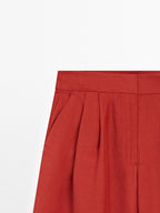 Flowing trousers with darts