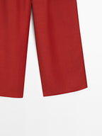 Flowing trousers with darts