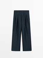 Loose-fitting linen blend trousers