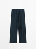 Loose-fitting linen blend trousers