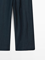 Loose-fitting linen blend trousers