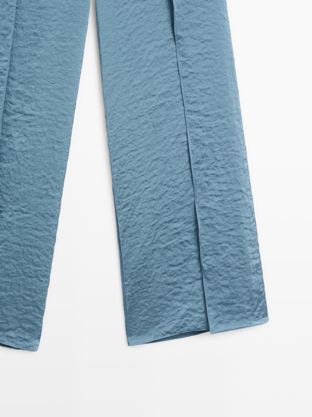 Flowing palazzo trousers with slits