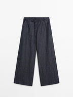 High-waist wide-leg jeans with belt