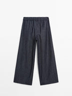 High-waist wide-leg jeans with belt