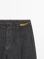 High-waist wide-leg jeans with chains