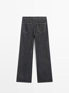 High-waist wide-leg jeans with chains