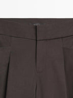 Wide-leg pleated trousers