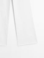 Textured wide-leg denim-effect trousers