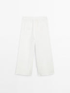 100% linen trousers with frayed detail