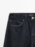 Mid-waist straight-leg jeans with seam detail