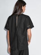 Loose-fitting blouse with sleeve detail