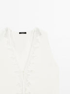 Flowing blouse with lace detail